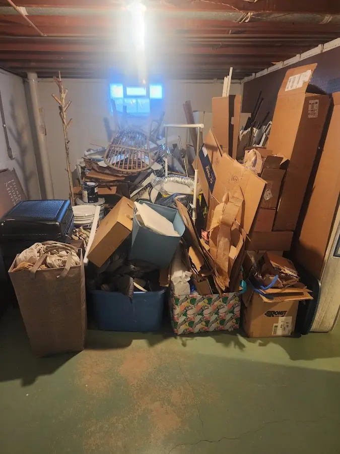 Roll-off dumpster container at job site for 2 Yard Dumpster Rental in Mechanicsville